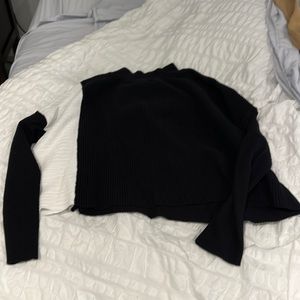 Black and white mock turtle neck sweater.